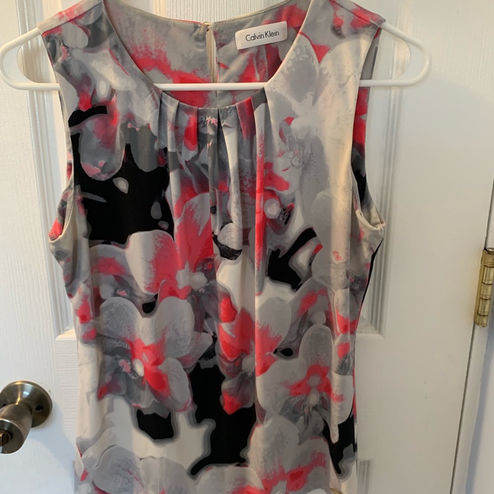 Calvin Klein tank too blouse for work. It is a size medium like new condition.